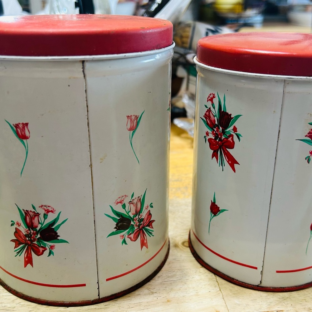 Vintage red roses metal canisters, set of 2. Good condition for their age.